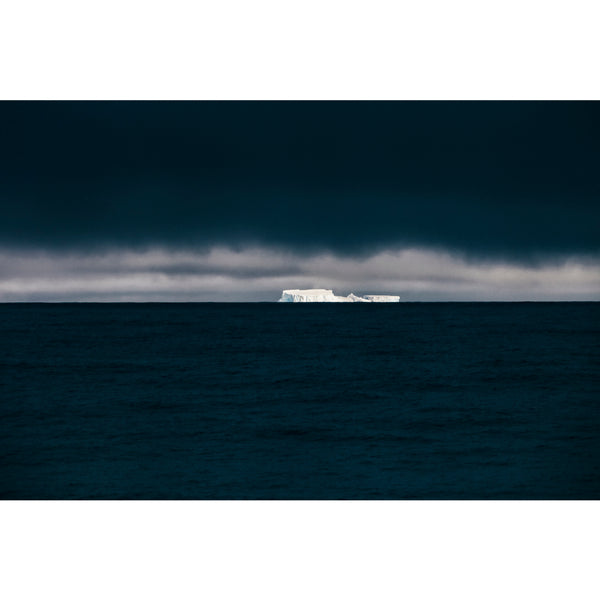Huge table iceberg appeared on the horizon.