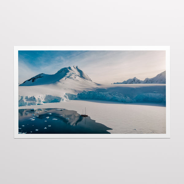 We stand in Port Lockroy, tied to ice floes.